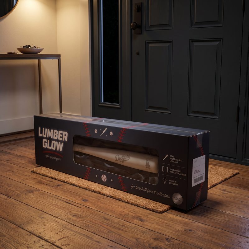 The Lumber Glow shipping carton on a doorstep